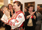 Commissioner Georgieva applauding dancers during the Bulgarian national days at the European Commission (c) EU