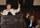 "Commissioner Georgieva raising her hand and talking to students at Sofia University, together with Bulgaria's president Rossen Plevneliev © EU