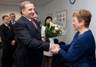 Handshake between Vladimir Puchkov, on the left, and Kristalina Georgieva