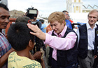 Kristalina Georgieva meets locals waiting outside the camp of the Belgian First Aid and Support Team in Tacloban