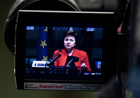 Commissioner Georgieva as seen through a camera at the Natural Catastrophes conference © EU