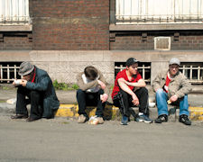 Men sitting outside © European Commission
