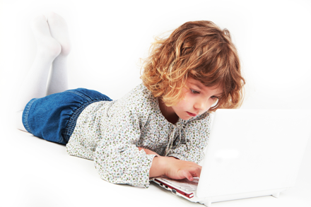 Girl using laptop (c) istock