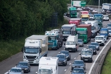 Cars and trucks on a busy motorway