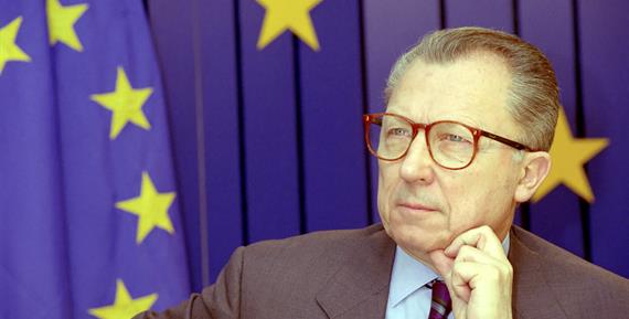 Portrait of Jacques Delors, EU flags on the background