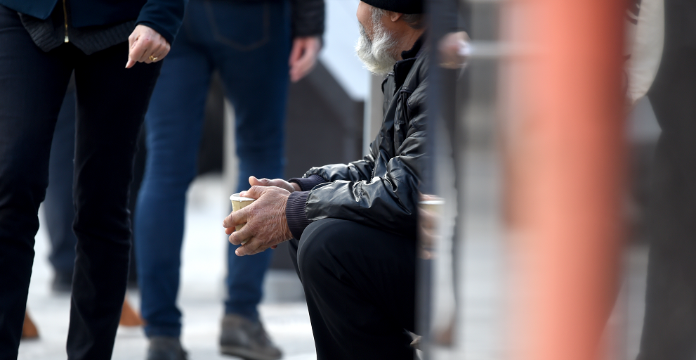 Person begging in the street