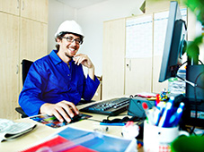 A worker in an office wearing a working suit
