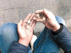 Hands holding Euro coins
