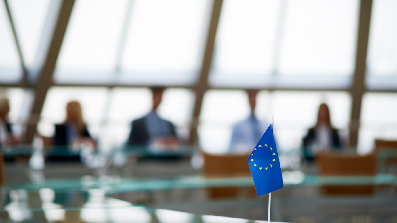 EU flag on a meeting room table