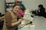 Fiorella, 50, driver en klädbutik med skrädderi, efter att i två år ha levt på gatan i Bologna i Italien.