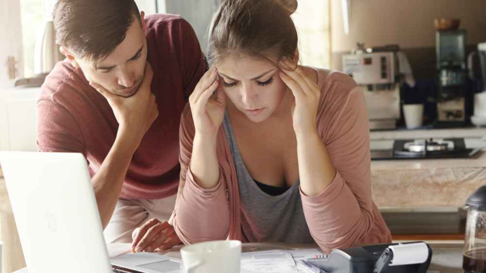 Image: Young family with many debts facing financial stress