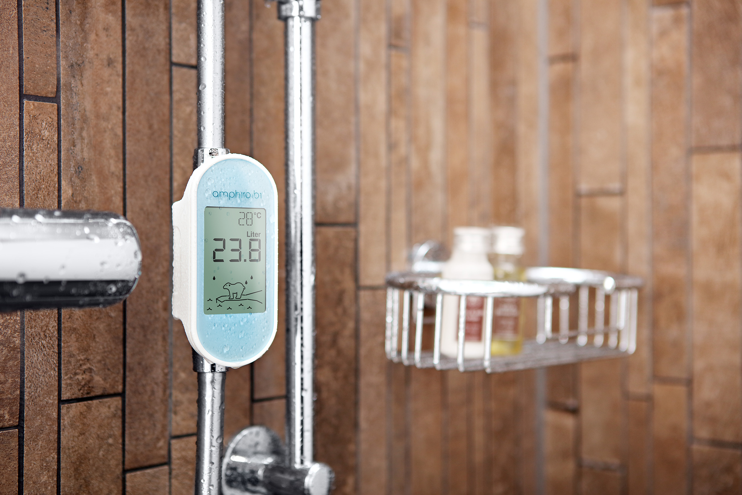 Image of smart shower monitor indicating water temperature and consumption