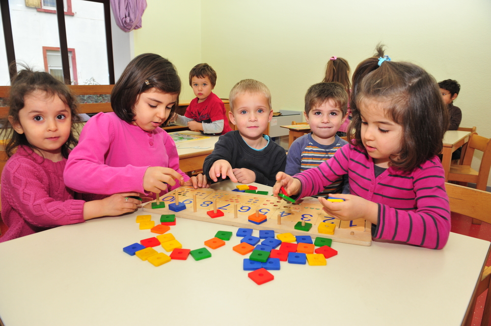 Frankfurt, Germany - November 25, 2011- Refugee children with migration background playing in school.
