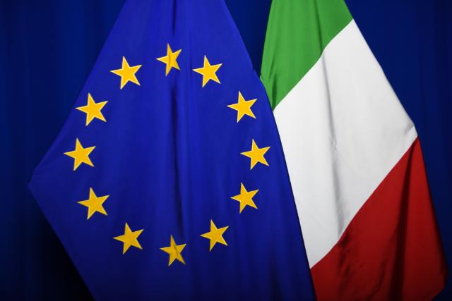 The national flag of Italian next to the European flag © European Union