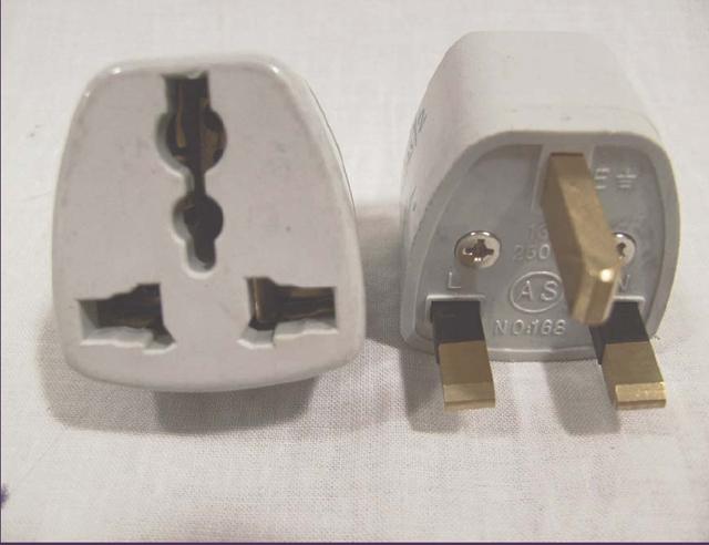 Photo of recalled product: Travel Adaptor - AS