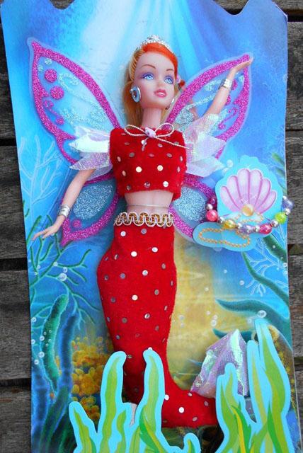 Plastic doll with accessories
