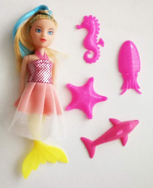 Plastic doll with accessories
