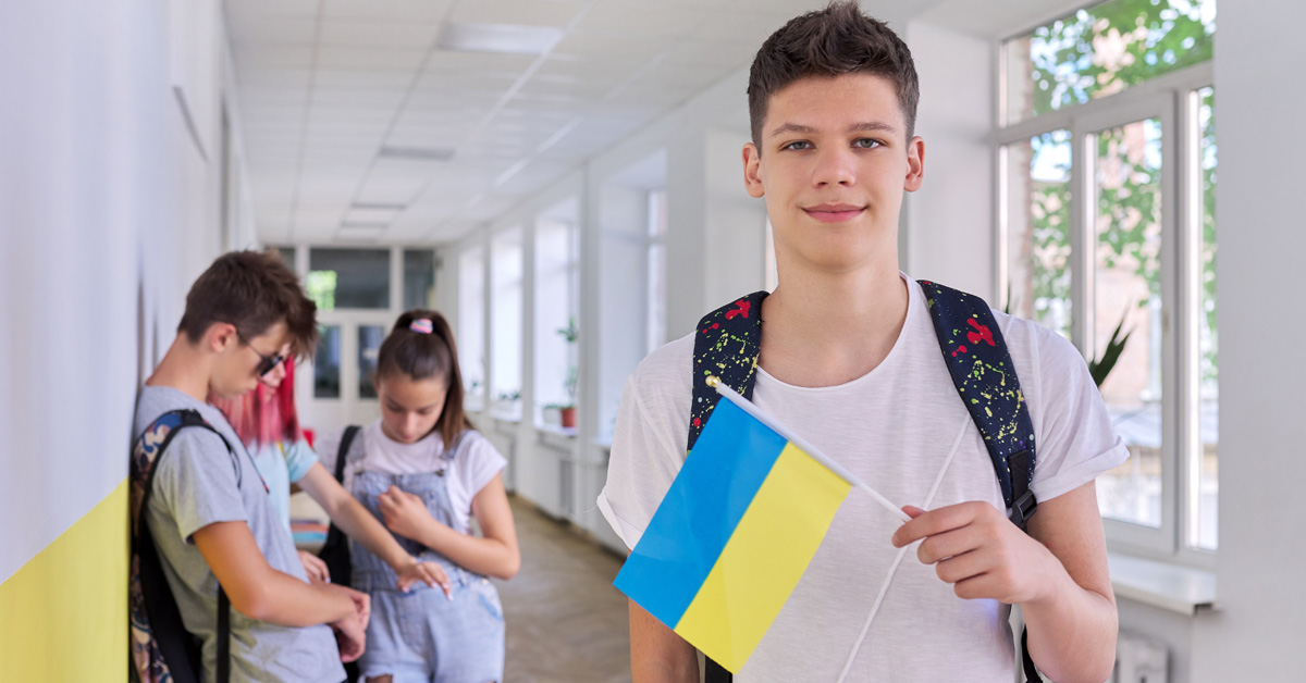 Ukrainian student with a Ukraine flag in his hand